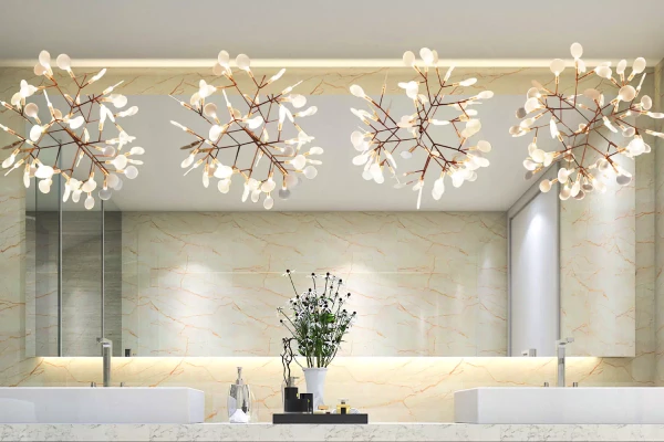 Pavana decorative lamp in a wide bathroom backlit mirror mount on a white porcelain wall.