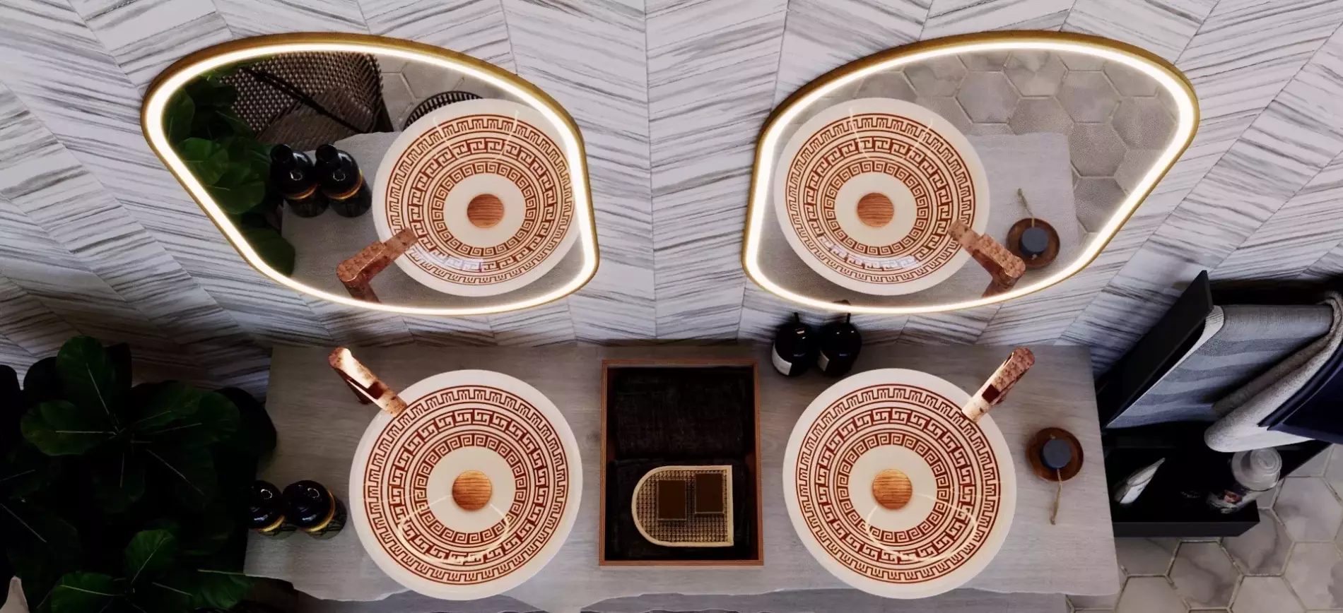 Overhead shot of a double basin with two lighted oval-shaped mirrors in a restroom.