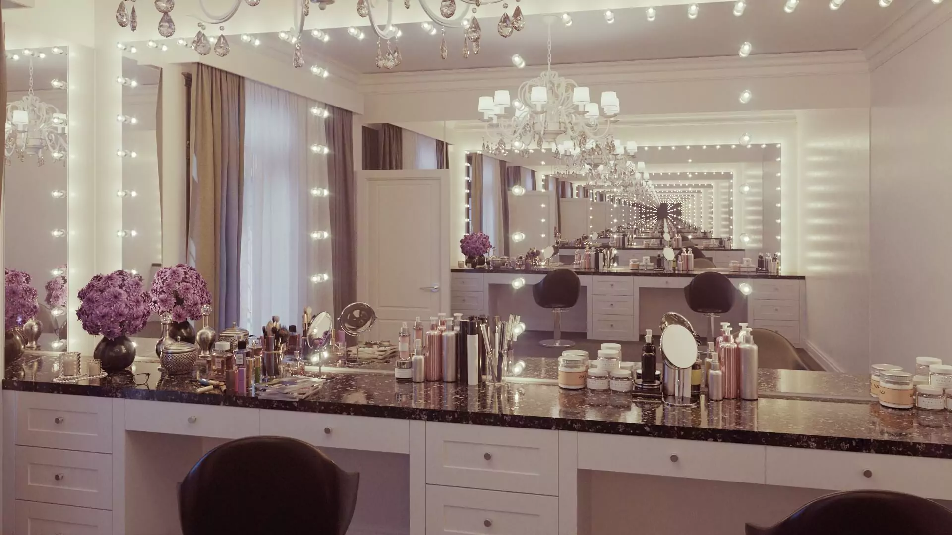 A wide hollywood mirror with makeup kit on a countertop cabinet.