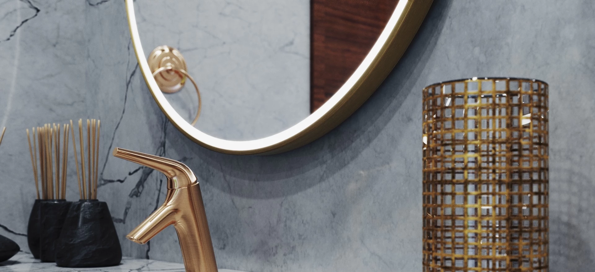 Golden faucet with a round illuminated frame mirror and aromatic insense sticks.