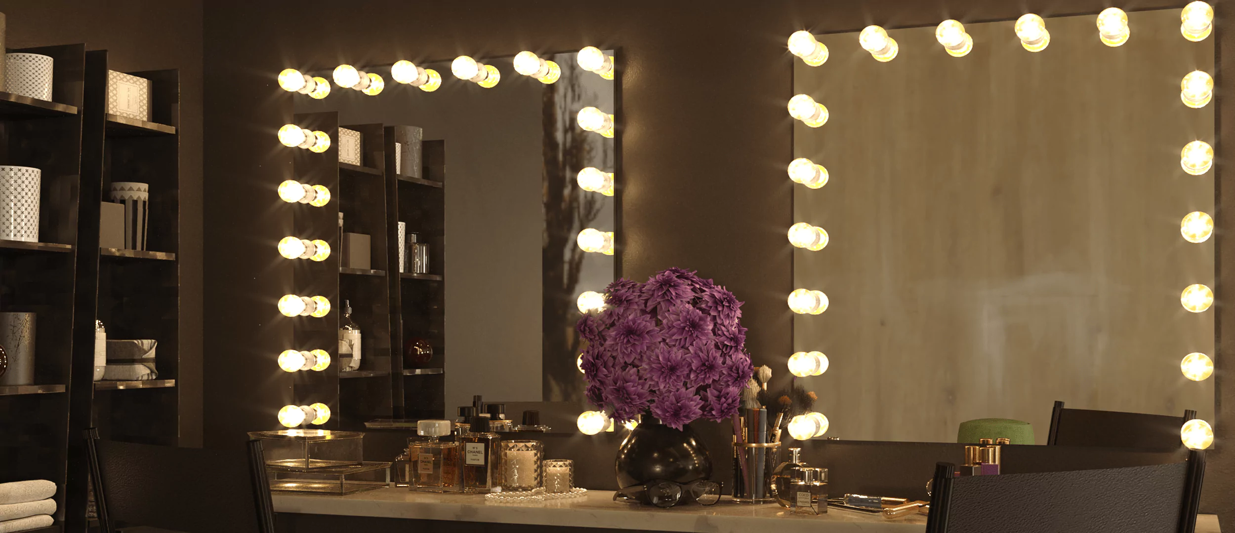 Hollywood vanity mirror with a purple flower in a vase and beauty essentials.